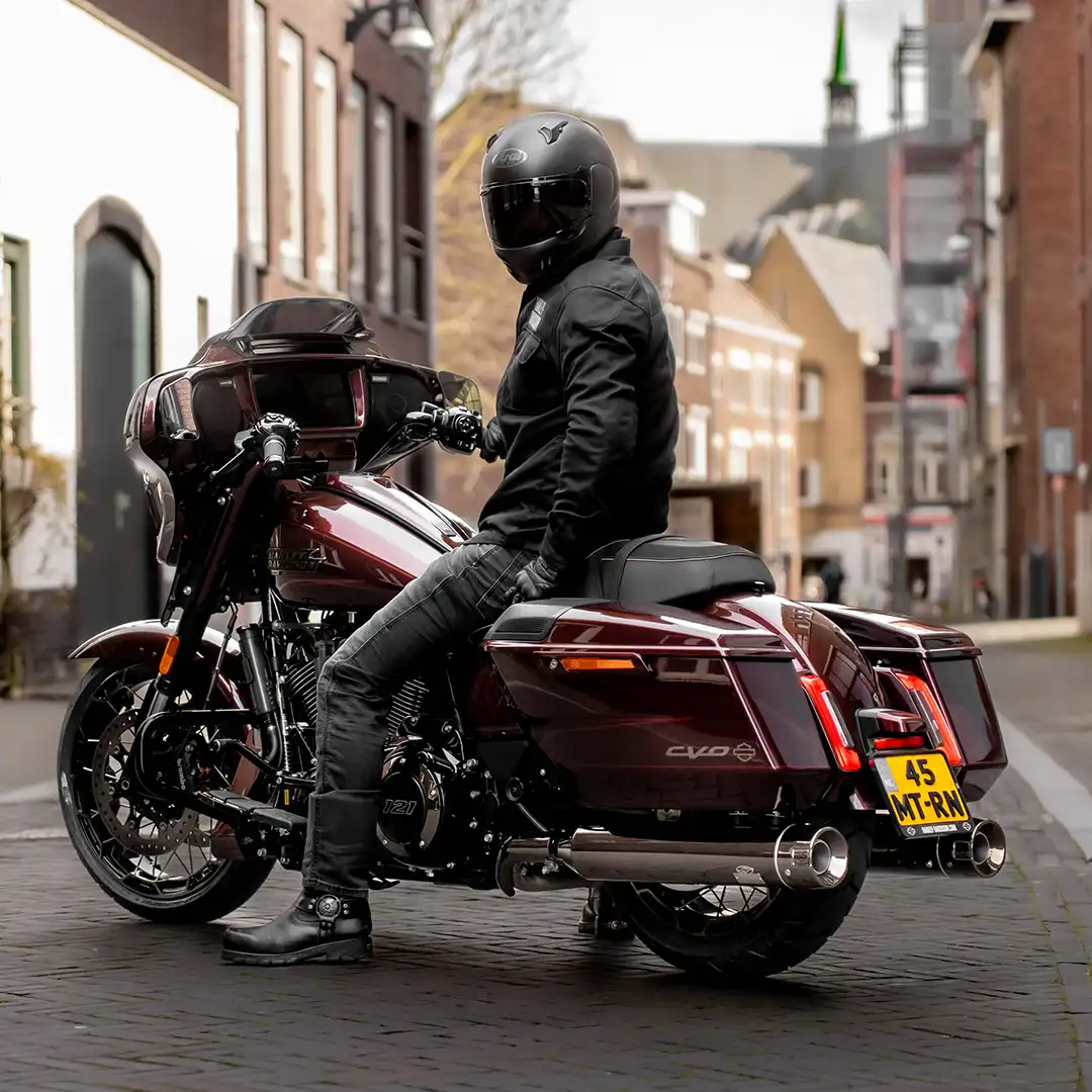 Harley-Davidson CVO 121 with a Dr. Jekill & Mr. Hyde® Exhaust with a rider parked in the middle of the street